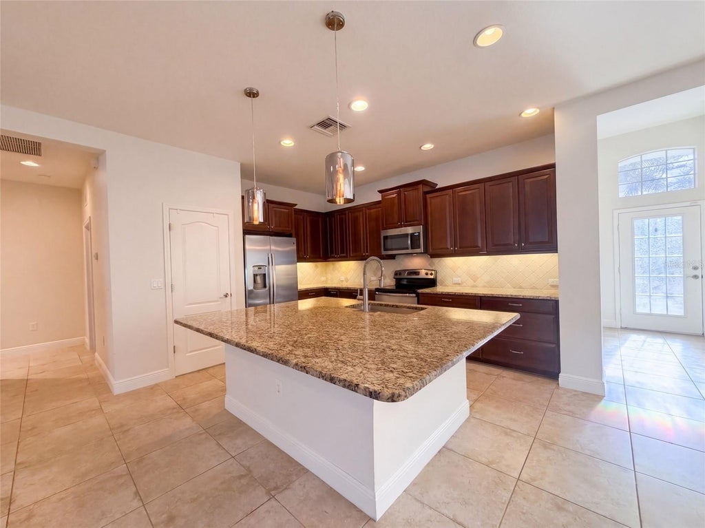 Photo of 1416 Hickory View Circle, Parrish, FL 34219 (MLS # O6439503)
