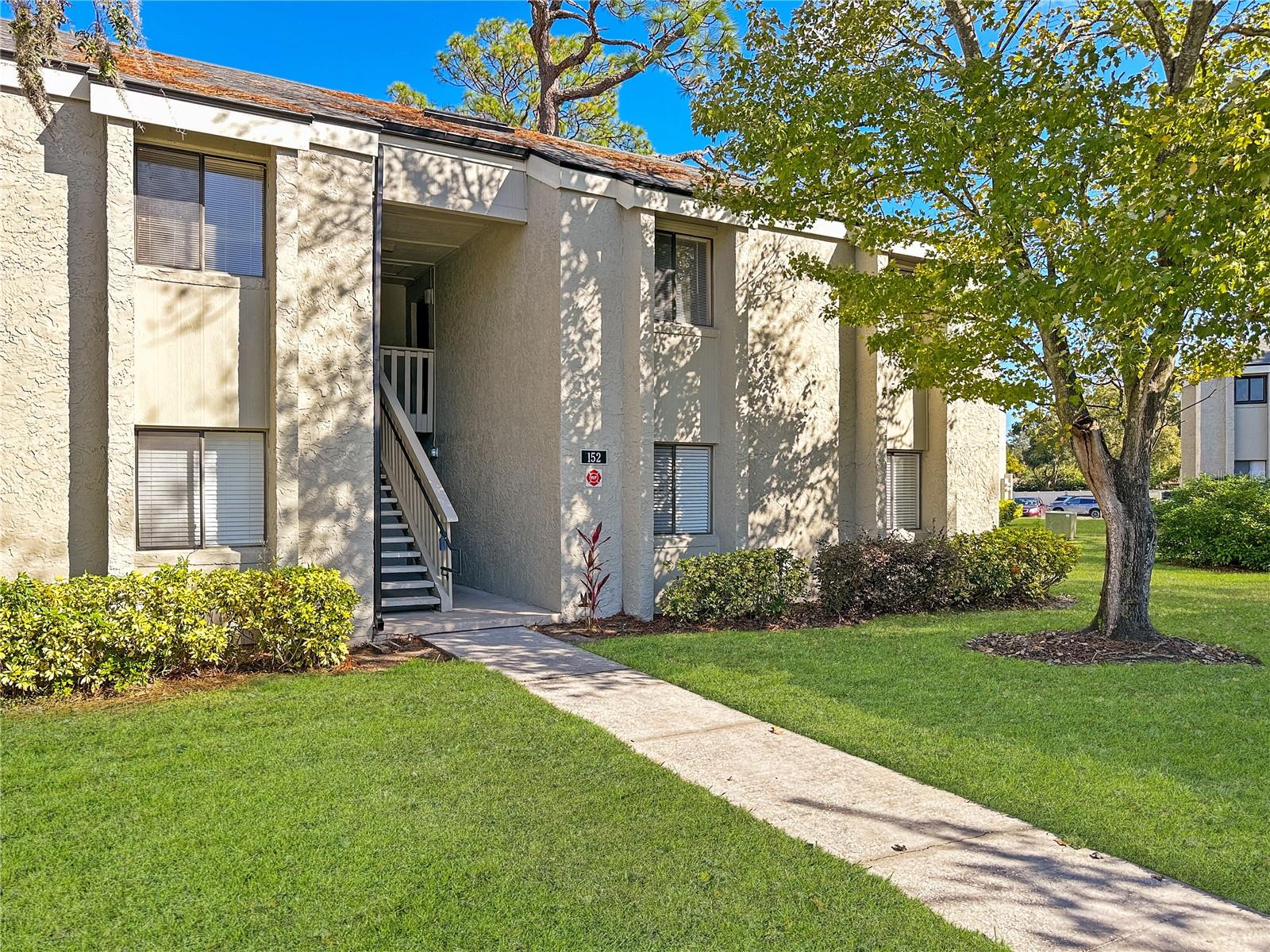 Updated and spacious condo on FIRST LEVEL close to community pool and laundry. 2 Bedrooms and 1 full Bathroom /1,050 SqFt +++. OPEN FLOOR PLAN. FULLY Equipped Kitchen with newer appliances and gorgeous granite countertops. Beautiful covered lanai with view of the outdoors. No immediate rear neighbors. private storage closet. HVAC is only 2 years old, water heater was replaced approx 7 years ago. This community has it all...2 laundry areas, 2 community pools, a racketball court, a Tennis court, Exercise Room, picnic area, community mailbox, 2 guest rental apartments, and much more!
