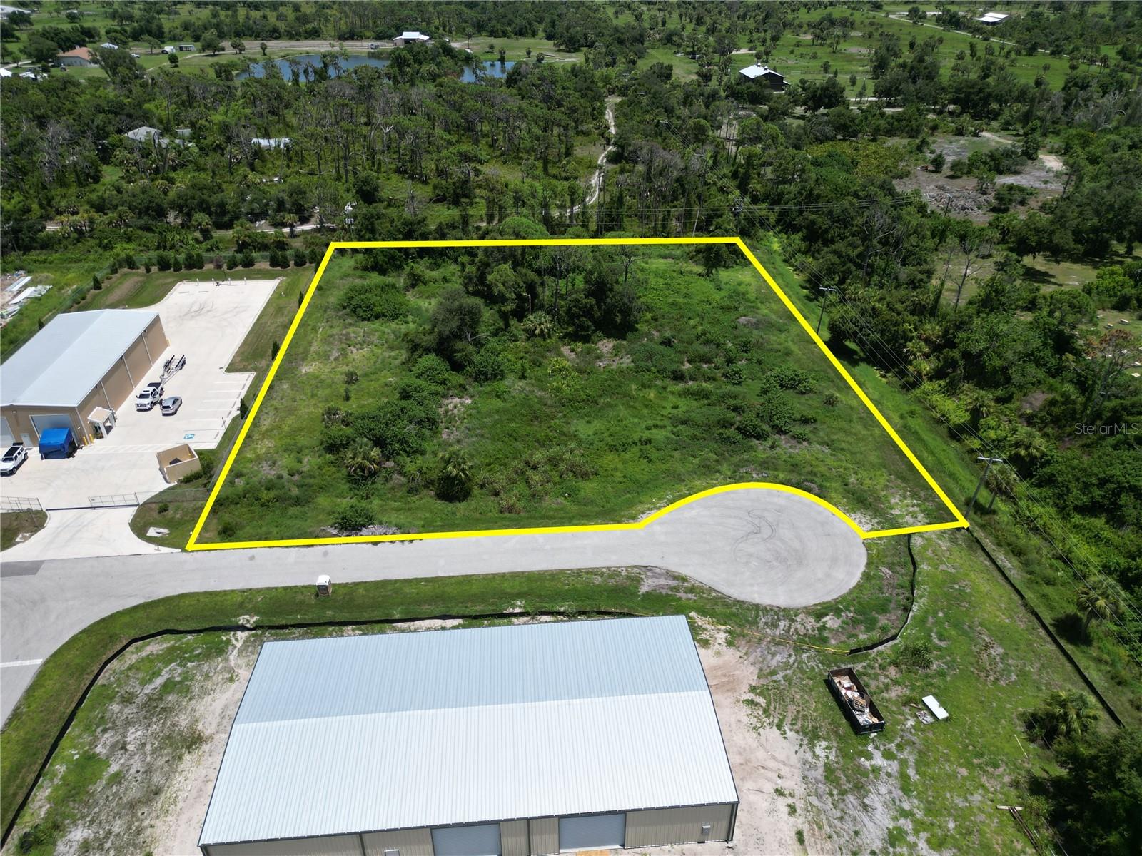Price Improvement on 10-21-24 of $25K; down to $774,000. Owners have purchased an existing building, so take advantage of the Full Set of Building Plans that can get you in a new building in approximately six months. Two Acres For Sale - Zoned Industrial - Full Set of Building Plans Available - Building Permit ready in 30 to 45 days. Current Site Plan shows two one story buildings. Each building is approximately 8,400 square feet in size. North Building is 50 x 168 designed for seven RV / Storage Units. South Building is 60 x 140 designed for Office & Manufacturing. Take advantage of this rare opportunity to develop two acres of industrial space with full set of building plans. This will save you roughly two years in engineering design, environmental studies and permitting. Located in Morris Industrial Park off River Road giving you direct access to US-41 and I-75. Take advantage of this rare opportunity now before it's gone.