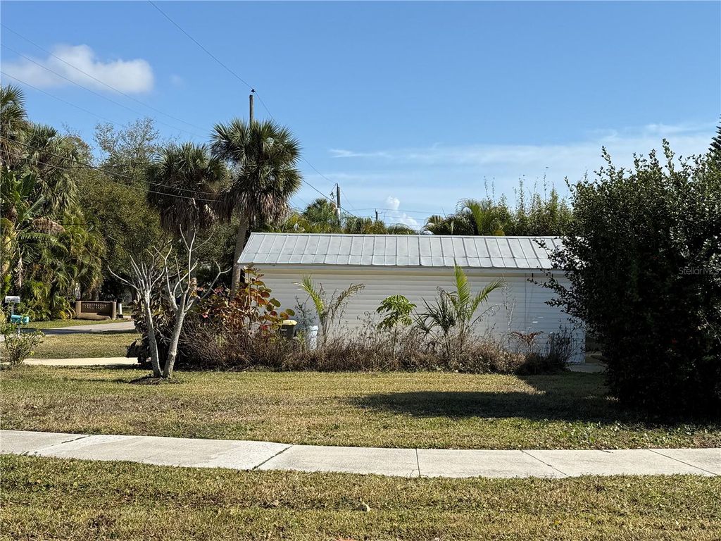 Photo of 451 W Virginia Avenue, Punta Gorda, FL 33950 (MLS # C7522931)