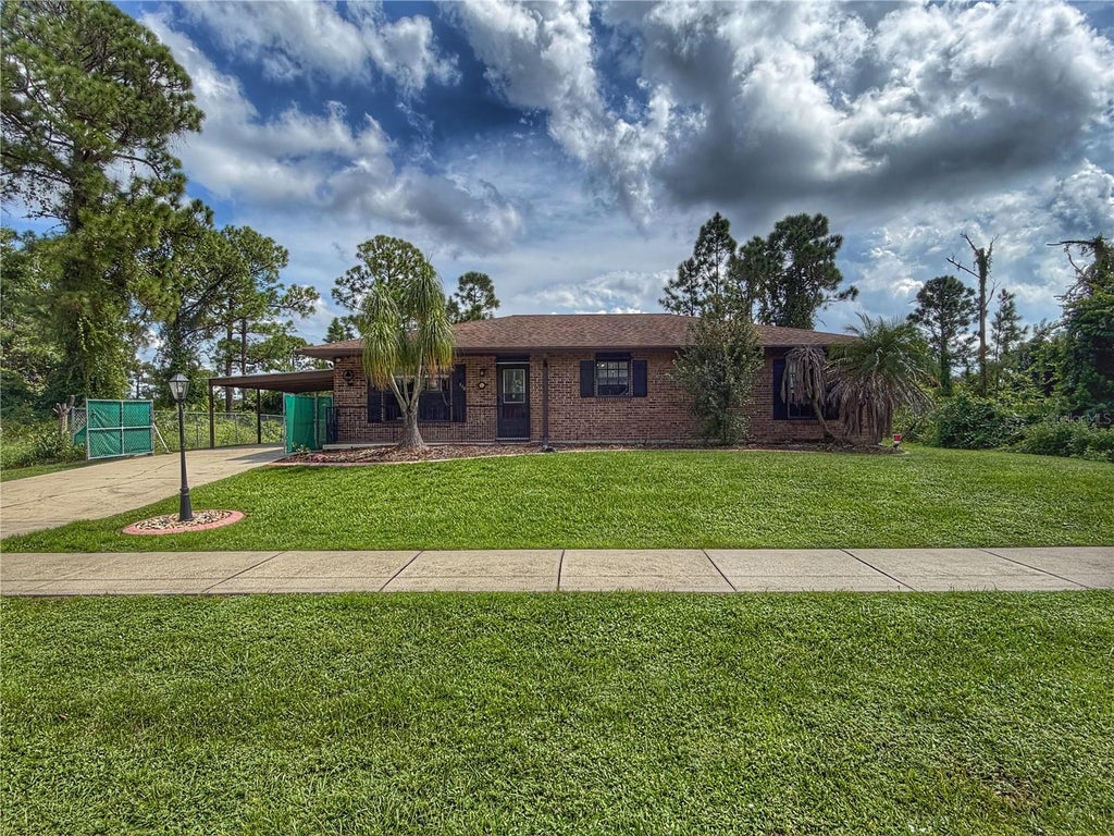 Photo of 516 Cougar Boulevard, Sebring, FL 33872 (MLS # P4939894)