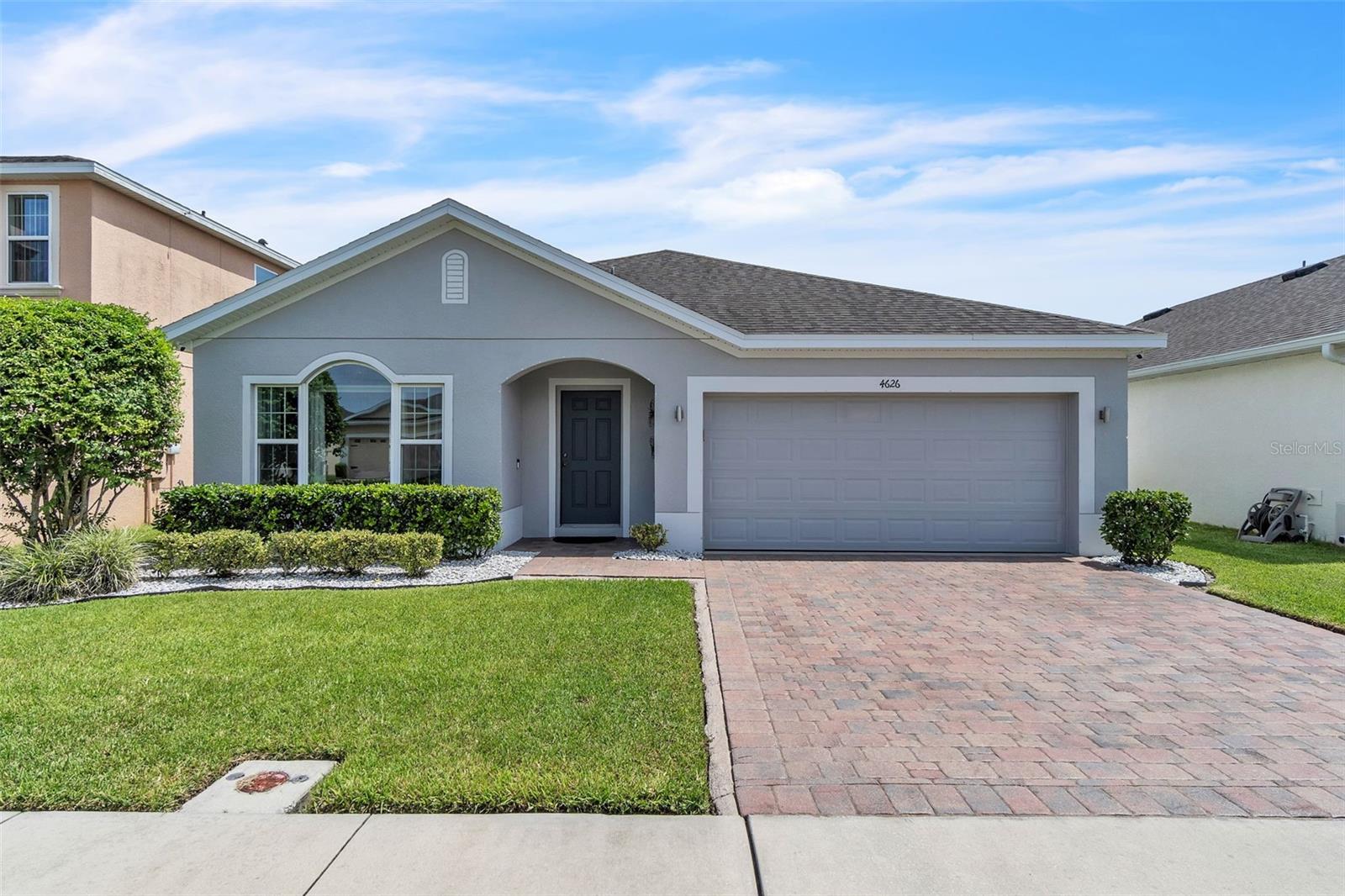 Welcome to 4626 Baymoor Dr, a beautifully upgraded 4-bedroom, 2-bathroom home nestled in a quiet community in Kissimmee, FL. This move-in ready property offers many recent upgrades that bring both style and functionality to every corner. Step inside to discover a spacious, open-concept floor plan with modern finishes, updated flooring, and plenty of natural light. The kitchen features newer appliances, granite countertops, refreshed cabinetry, and a large breakfast bar—perfect for entertaining. The primary suite offers a serene retreat with a walk-in closet and updated ensuite bath featuring dual vanities and a beautiful shower. The fully fenced backyard is ideal for gatherings, play, or simply relaxing after a long day. Conveniently located near schools, shopping, dining, and major highways, this home combines comfort and location perfectly. Don’t miss your chance to own this upgraded gem—schedule your showing today!