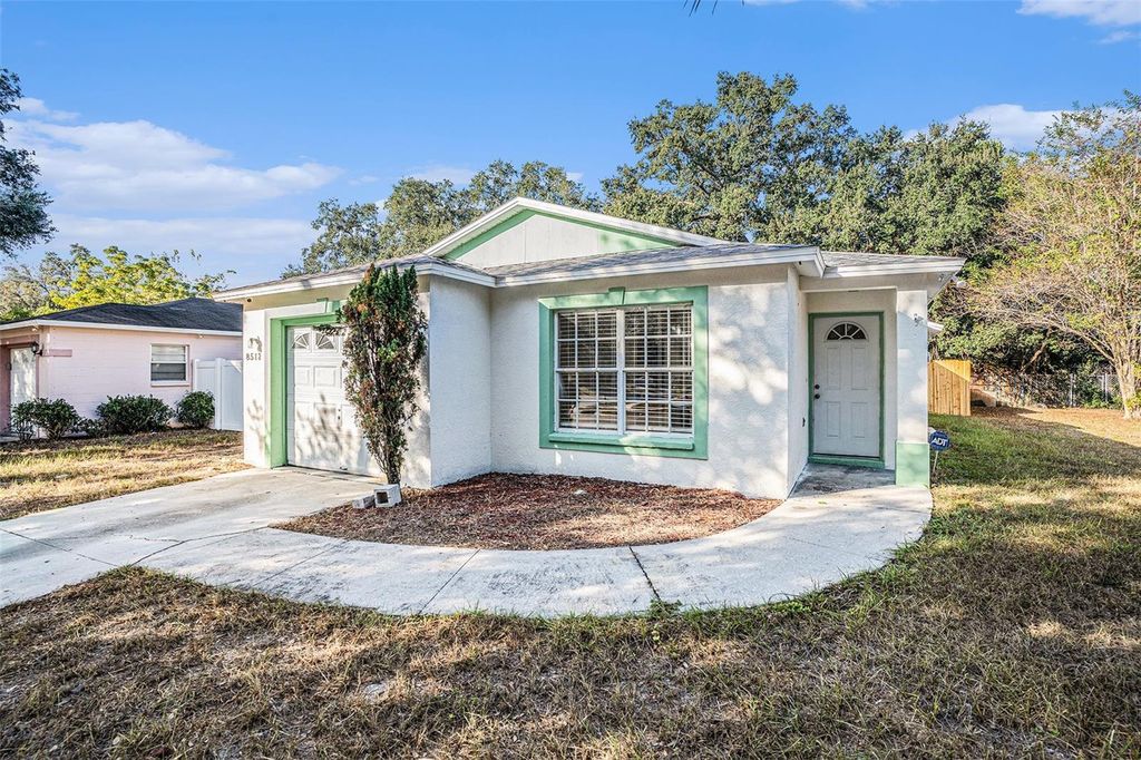 Photo of 8512 Lazy River Drive, Tampa, FL 33617 (MLS # TB8461793)