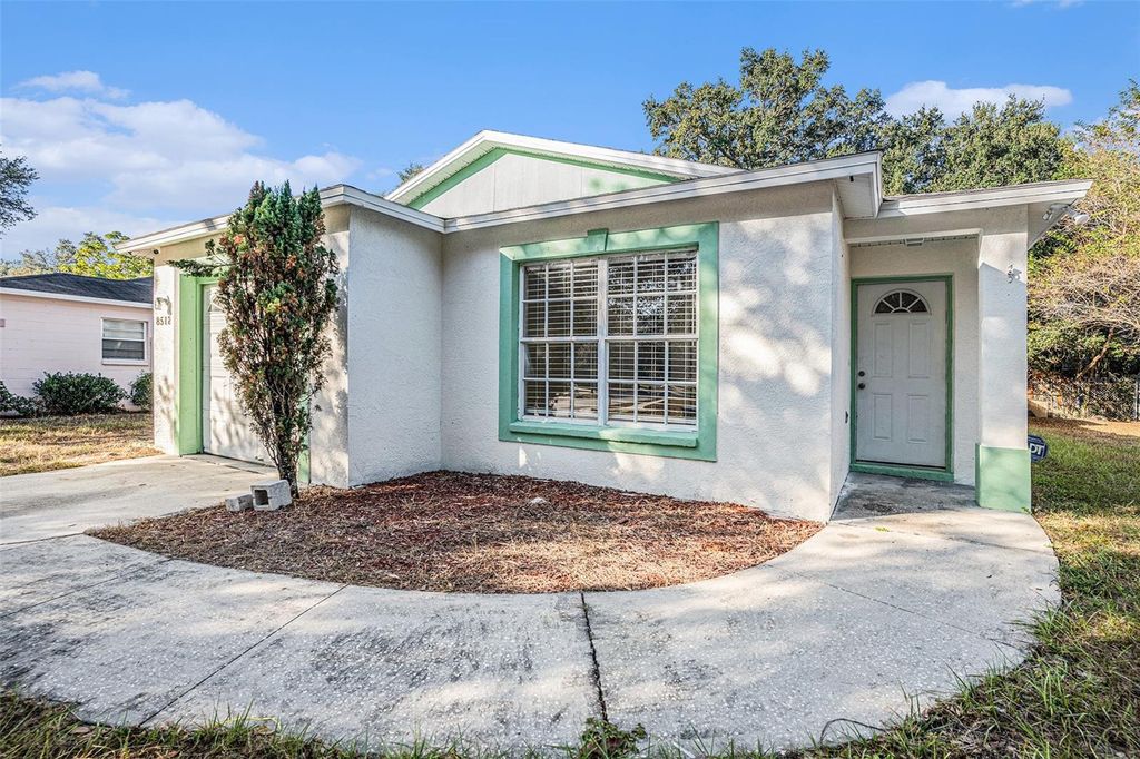 Photo of 8512 Lazy River Drive, Tampa, FL 33617 (MLS # TB8461793)