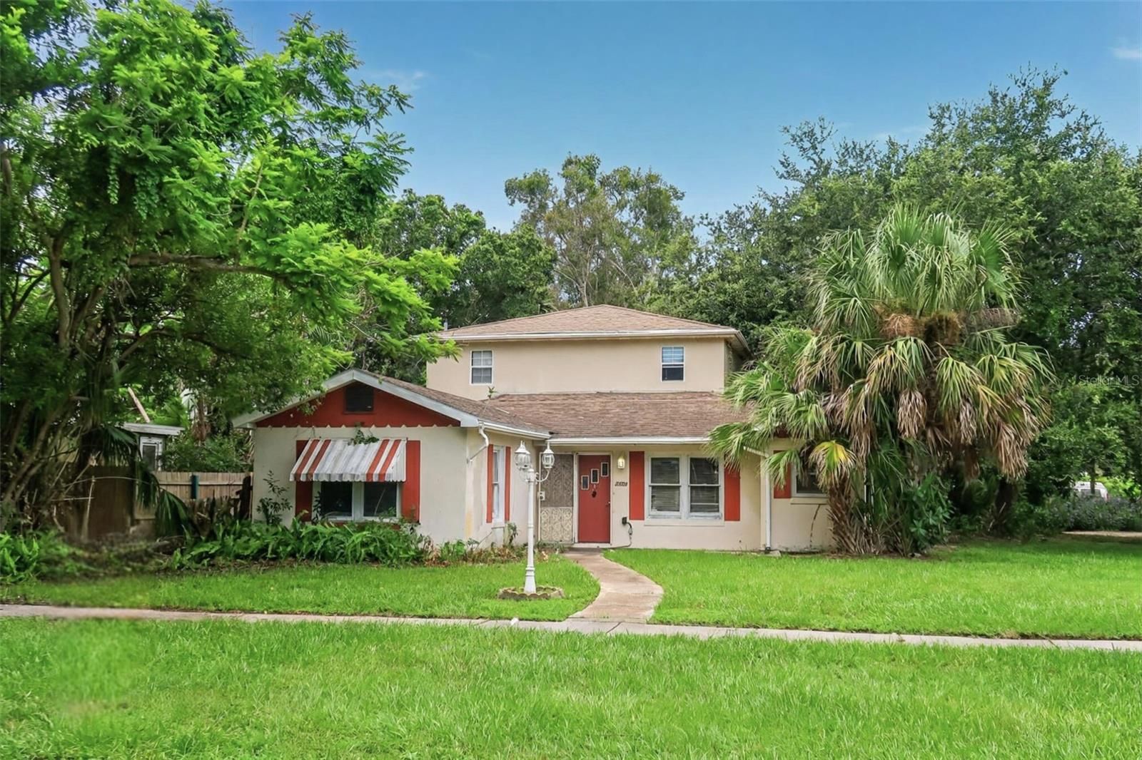 Welcome to 2501 54th St S in Gulfport. This two-story home offers 3 bedrooms, 2 bathrooms, and a bonus room, with potential to be converted into a 4-bedroom, 3-bathroom layout. 2,614 Sq Ft of living space and sits on a 61x128 corner lot. The layout allows for the possibility of splitting into separate upstairs and downstairs units. The home has an updated electrical system, a 2022 roof, and a 2022 AC. It is being sold as-is as an unfinished remodel, requiring interior and exterior cosmetic updates. Located in the heart of Gulfport, close to the waterfront, local shops, restaurants, and the popular Gulfport Arts District.