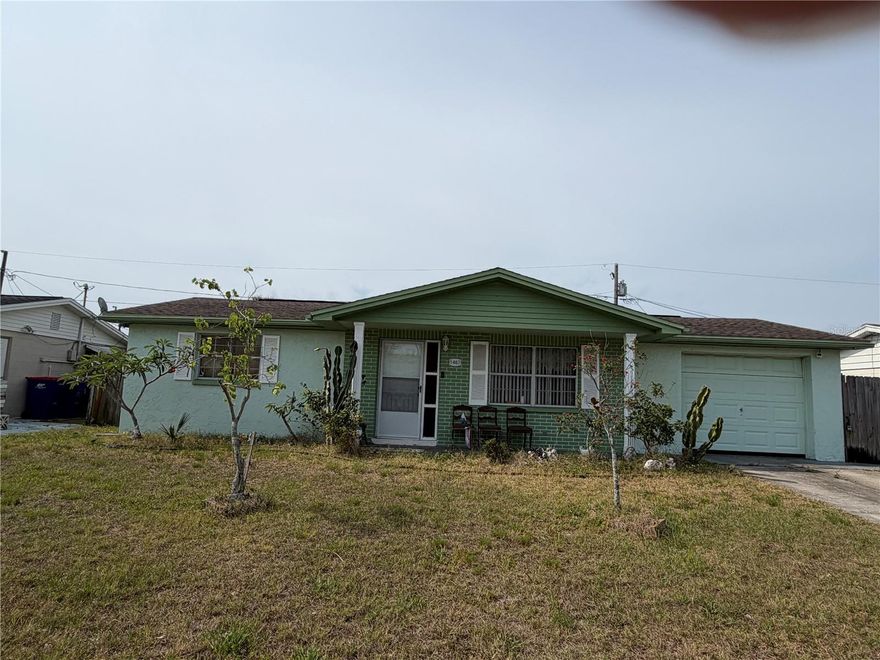 Under contract-accepting backup offers. Investor's Special.  Price reflects Must Sell Quick.  Not in a flood zone.  2 bedroom, 1 bath, 1 car garage.   Bonus Room.  Screened patio.   High end Solar 32 Panel, full battery bank System only 3 years old. Roof 9 years.  HVAC 9 years.  No HOA Fees. Fenced backyard
