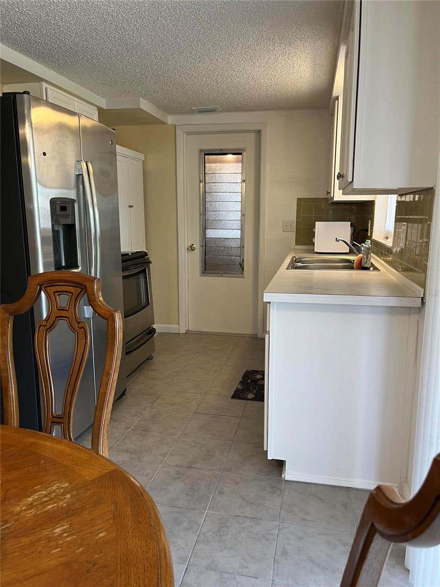 Photo of 3632 Pensdale Drive, New Port Richey, FL 34652 (MLS # O6432729)