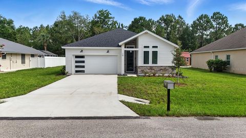 Photo of 15 Ulmus Place, Palm Coast, FL 32164 (MLS # FC316350)