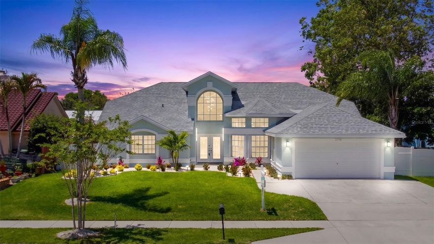 One or more photo(s) has been virtually staged. Beautiful Fully Renovated 3bed 2bath + Pool w/covered patio & Screen Enclosure + Fireplace, & 2 CG. Fully Renovated w/tasteful, updates inside & outside that include: New Roof, AC, Smart Wi-Fi throughout, inclusive of: Fans & Lutron Lighting Control,USB & UTC outlets,Pop-up outlets, massive kitchen counter w/ huge bar top,New SS Appliances,Shaker Soft Close cabinets in Kitchen & Baths,Lots of Cabinet & Storage Space.Quartz Countertops,Cathedral ceilings,New Solid-Core Doors,Baseboards, Trim.New Baths,Luxury Vinyl Wood Plank Floors,Fresh Int & Ext Super Premium Paint,New LED Lights/Fixtures,Smoke &CO detectors,Toilets,Faux Wood Blinds w/ lots  of Lighting throughout. New Screened in pool area. New Epoxy Garage Floor,Large Driveway for Lots of Parking.This Home Has It All and Wont Last Long!