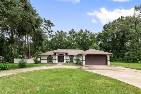 Photo of 611 NE 10th Boulevard, Williston, FL 32696 (MLS # OM707035)