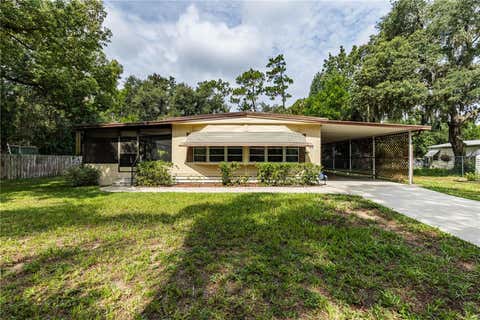 Photo of 35737 Shelley Drive, Leesburg, FL 34788 (MLS # G5115914)