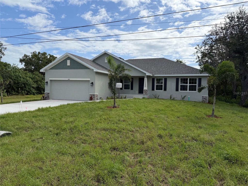 Photo of 404 Paramaribo Street, Punta Gorda, FL 33983 (MLS # C7525426)