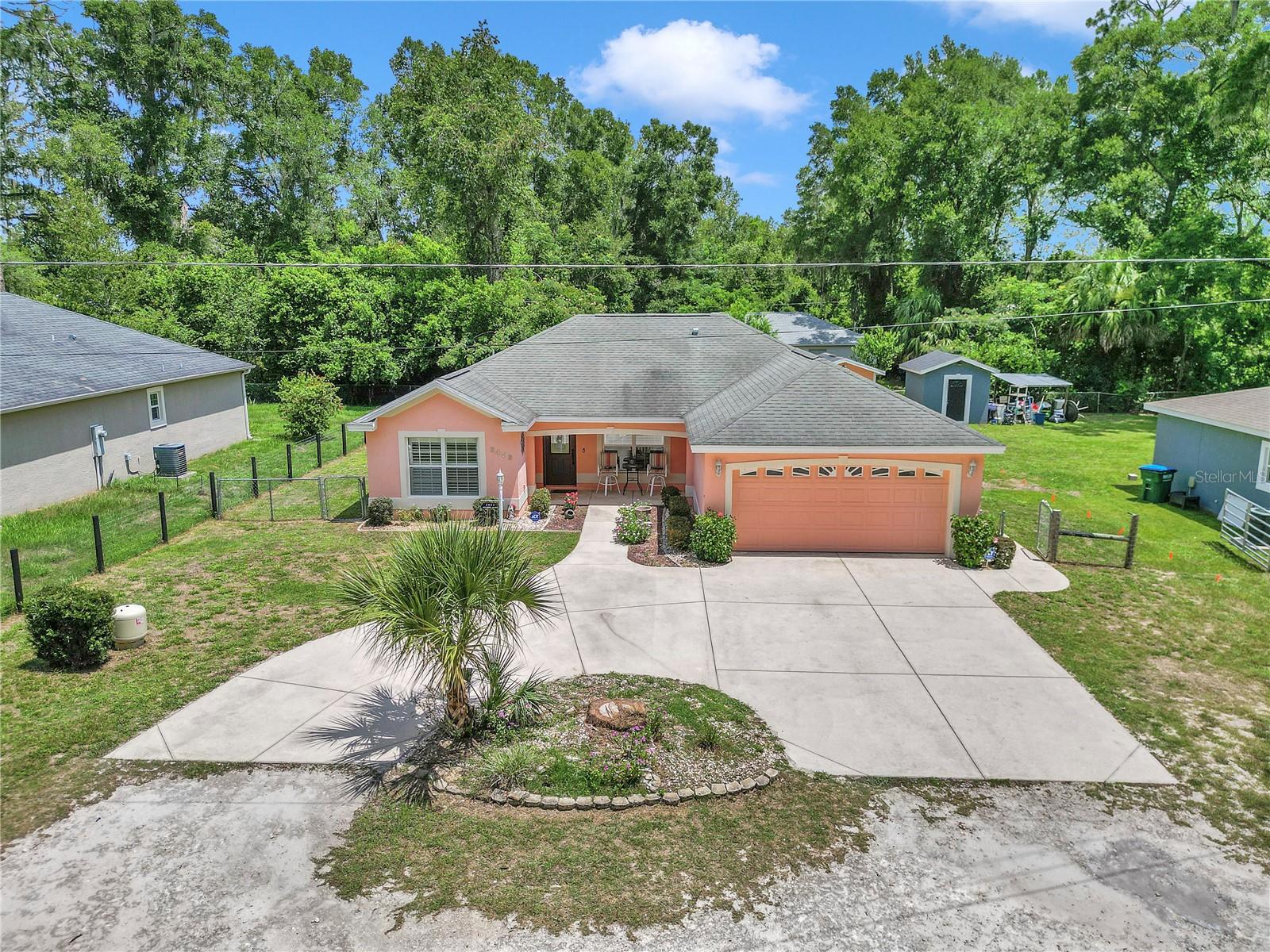 NO HOA FEES!! An easy commute to I-75, just minutes from Belleview, Ocala, and The Villages.
This beautiful 3 bedroom 2 bathroom 2 car garage in Belleview Heights Estates awaits you!! Offering 1,439 sq ft of comfortable living with generous driveway space to host the holiday gatherings. This home is Move-in ready and features updated fixtures and fresh finishes throughout the home. A split floor plan to add privacy, an indoor laundry room, plantation shutters to help block out the Florida heat and save on your electric bill. With a peaceful screened in lanai to relax, unwind and enjoy your coffee bug free!
There is a 12x10 shed out back to hold all of your yard tools, with an attached 9x12 office under heat and air for any business duties! There is also a washer and dryer hookup in the Garage.