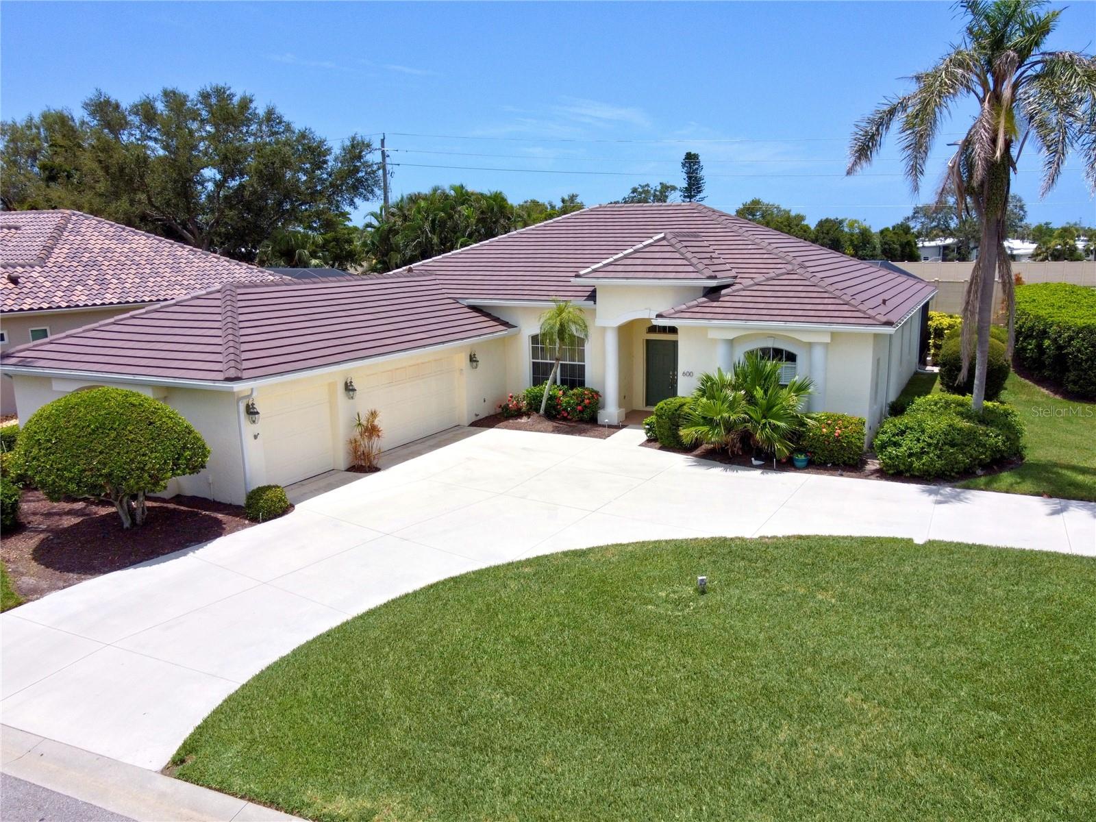 Welcome to your Florida dream home in the sought-after Pelican Pointe Golf & Country Club which is one of Venice’s premier gated communities! This meticulously maintained 3-bedroom, 2-bath home has been given a fresh coat of interior paint, boasts a new roof (2025) and has a very spacious 3-car garage. Step inside and be greeted by an open-concept floor plan with high ceilings and abundant natural light. The spacious living room includes a full built-in entertainment center and has pocket sliding glass doors to the lanai and pool. The master suite features tranquil views of the pool, huge walk-in closets, and an en-suite bath with dual vanities, soaking tub, and separate shower. Your large private lanai overlooks lush tropical landscaping. The screened (caged) pool offers year-round outdoor living and a serene retreat after a day on the golf course or at the beach. Pelican Pointe offers resort-style amenities including a championship 27-hole golf course, tennis and pickleball courts, a heated pool, fitness center, clubhouse with restaurant and bar, and an active social calendar. HOA fees include ground maintenance, cable, and internet for added convenience. Located just minutes from historic downtown Venice, charming shops, and award-winning Venice Beach, this home offers the perfect blend of comfort and Florida lifestyle. Don’t delay, see this one today!