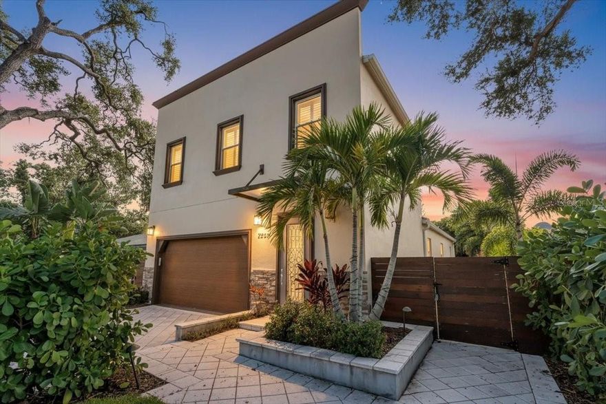 Discover this true custom-built home in the desirable Alta Vista neighborhood just minutes from downtown Sarasota. Built in 2014 and thoughtfully updated throughout, this residence blends modern comfort with high-quality finishes and exceptional craftsmanship. The beautifully remodeled kitchen offers quartz countertops with matching backsplash, custom cabinetry with soft-close pull-out drawers, new 2025 stainless steel appliances, and a custom bar area. Additional design elements include built-ins, a stone-accent wall, decorative designer fireplace, bamboo wood flooring, crown molding, plantation shutters, and upgraded lighting and fans throughout.

The spacious first-floor primary suite features sliders to the private backyard, a mini split for personalized comfort, dual custom closet organizers, and a beautifully updated bath with tile and glass shower, quartz counters, and upgraded mirrors. A convenient half bath is located off the kitchen. Upstairs, you’ll find a built-in desk loft style, two guest bedrooms with custom closet organizers, and a second full guest bath. 

The outdoor area is designed for relaxation and entertaining with decking, pavers, enhanced exterior lighting, and updated electrical. The home also includes a brand-new roof, Honeywell whole-house control system with dual thermostats, rainbird automated 3-zone irrigation system, and impact windows and doors accompanied by plantation shutters throughout for that elegant, yet functional aesthetic interior feature. The air-conditioned garage offers epoxy floors, laundry with Electrolux appliances, a mini split, and additional storage. The home is equipped with a 50-gallon hot water heater and a front patio-side porch.

Located just minutes from Sarasota Memorial Hospital, Southside Village, and the vibrant downtown Sarasota Bayfront. Everything you ever need is just a short walk away! Do not miss this opportunity to own this beautiful custom-built home with the option to add a custom pool and/or separately purchase the adjacent vacant lot, providing additional space and expansion potential if desired! A true one-of-a-kind opportunity that will not last. Schedule your private showing today!