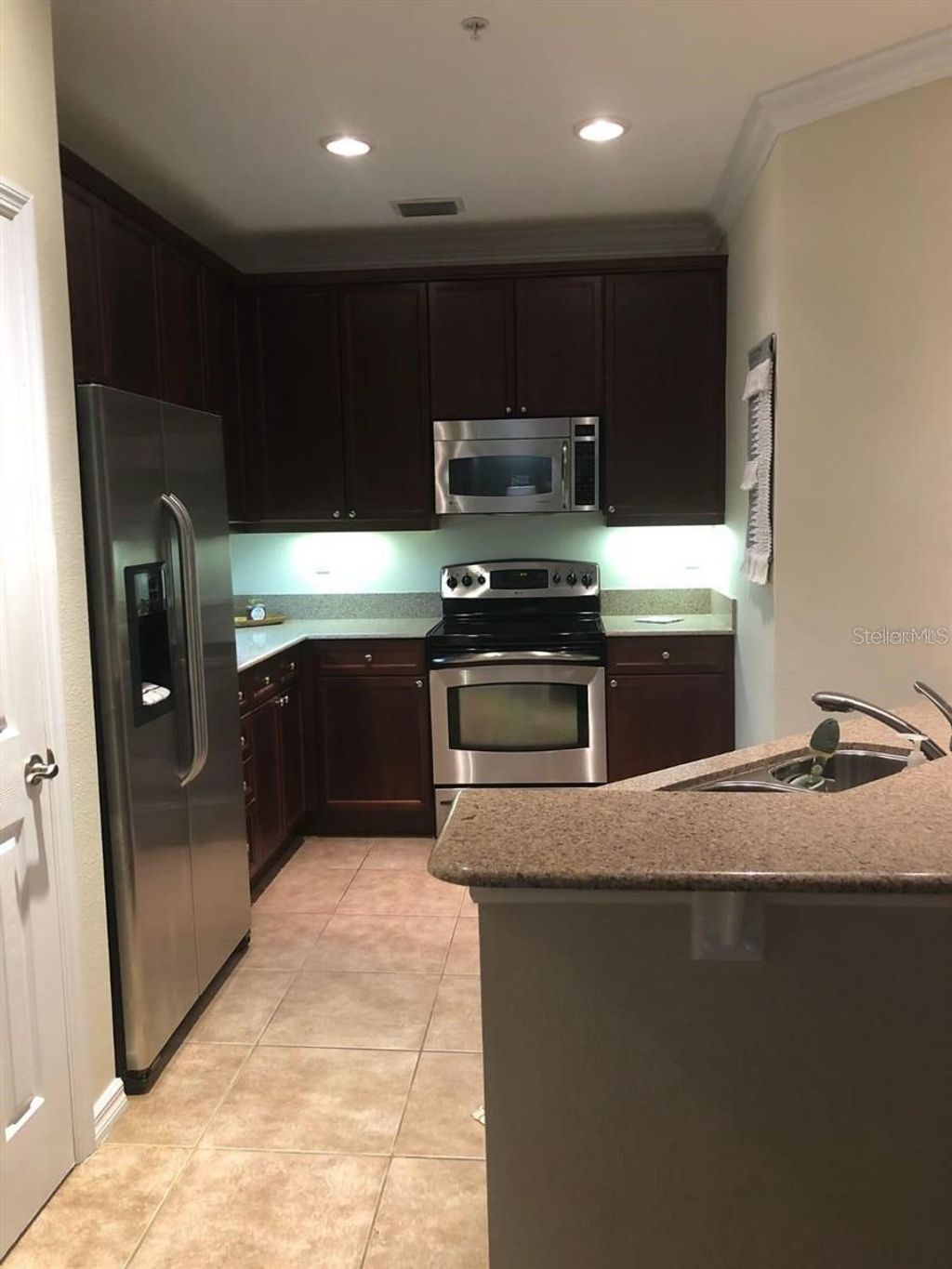 Photo of 11565 Mizzon Drive #209, Windermere, FL 34786 (MLS # O6382411)