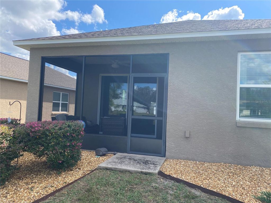 Photo of 9839 SW 99th Loop, Ocala, FL 34481 (MLS # OM712194)
