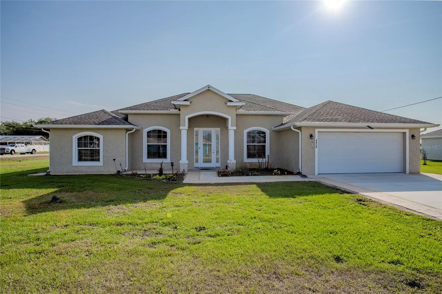 One or more photo(s) has been virtually staged. Welcome to 4820 Mackerel Drive, an inviting 3-bedroom, 2.5-bath home featuring stylish tile plank flooring throughout. The open layout offers a generous living area, formal dining space, and a dedicated home office.  The kitchen is designed for both everyday living and entertaining, with wood cabinetry, stainless steel appliances, granite countertops, a walk-in pantry, and a breakfast nook. French doors open to a screened patio with an outdoor kitchen—perfect for hosting.  The owner’s suite features a spa-inspired bath with dual vanities, a jetted tub, a walk-in shower with a rain head, and a large walk-in closet. Additional bedrooms are well-sized, and the home includes a half bath and a spacious laundry room with built-in cabinetry.  Built in 2022, the home offers a newer roof, AC, and water heater, all well maintained for added peace of mind. Ideally located in The Crossings of Sebring Ridge, just minutes from US Hwy 27 N, AdventHealth, shopping, and schools.  The shed does not convey and will be sold separately. The current refrigerator does not convey and will be replaced with a new unit, which may be different.  Schedule your showing today.