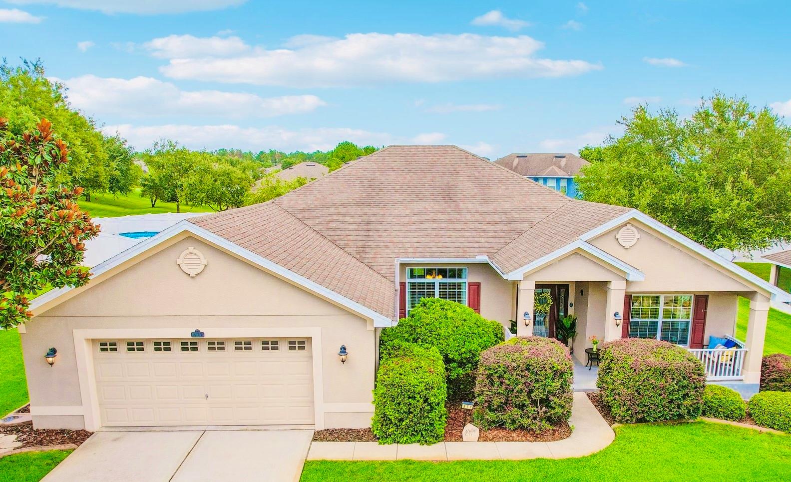 Welcome to 377 Dagama Drive, where cozy living meets quiet charm—nestled in the heart of Clermont’s rolling hills in sought-after Verde Ridge. This beautifully maintained 4-bedroom, 3-bathroom home offers 2,570 square feet of thoughtfully designed living space on an OVERSIZED (nearly 1/3 of an acre!), FULLY FENCED-IN BACKYARD—perfect for both everyday comfort and weekend entertaining. From the moment you arrive, you'll be welcomed by manicured landscaping and a charming covered front porch that invites you to slow down and stay awhile. Inside, the home opens to an expansive floor plan with vaulted ceilings and warm, elegant details like wainscoting in the formal dining area. A flex space just off the entry is ideal for a home office, playroom, or cozy reading nook. Across the hall, a formal dining room offers versatility and could easily transition into a lounge, craft space, or second living area. At the heart of the home, the kitchen features granite countertops, rich wood cabinetry, and a breakfast bar that’s perfect for casual meals or gathering with friends. The split-bedroom layout provides privacy and space for everyone, with the spacious primary suite thoughtfully separated from the guest bedrooms. Step outside to your very own backyard retreat—a screened-in lanai overlooking a large, private yard with ample room to garden, play, or even add a pool. Located in a peaceful community with low HOA fees, Verde Ridge offers residents access to a resort-style pool, playground, and scenic walking trails nearby. You’re also just minutes from top-rated schools, major healthcare providers, shopping, dining, Disney!, the Florida Turnpike, Orlando International Airport, and the vibrant heart of Downtown Clermont. This home offers the perfect blend of comfort, space, and location—don’t miss your chance to make it yours! **Furniture is Negotiable!** NEW ROOF COMING SOON (2025!) and NEW HVAC UNIT (2024!)