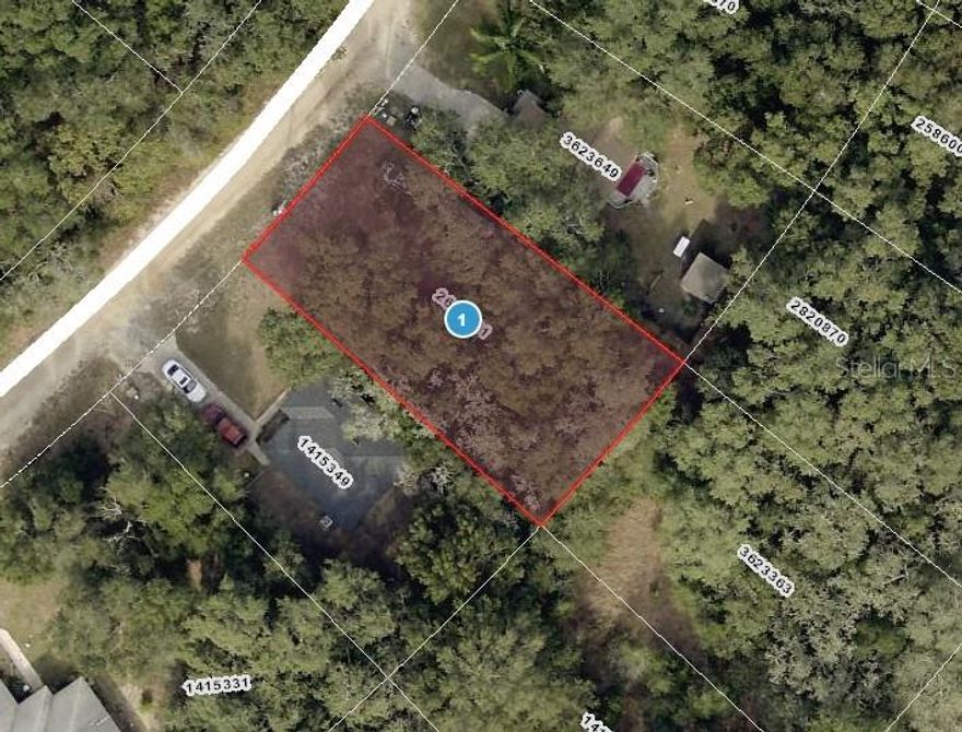 Discover the perfect spot to create your custom home on this peaceful lot in the desirable Carlton Village community. No HOA fees—giving you freedom and flexibility with your build. Whether you're planning a cozy retreat or a spacious family home, there’s no time limit to build. The neighborhood features a mix of single-family and manufactured homes surrounded with fishing ponds and mature trees providing a relaxed and welcoming atmosphere. Only 10 minutes from The Villages, shopping, dining, and entertainment! Take a drive by and see the possibilities for yourself. Price to sell - This is your chance to enjoy the Florida lifestyle in a natural, scenic setting!