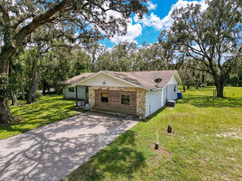 Photo of 15438 Azra Dr, Odessa, FL 33556 (MLS # W7878188)