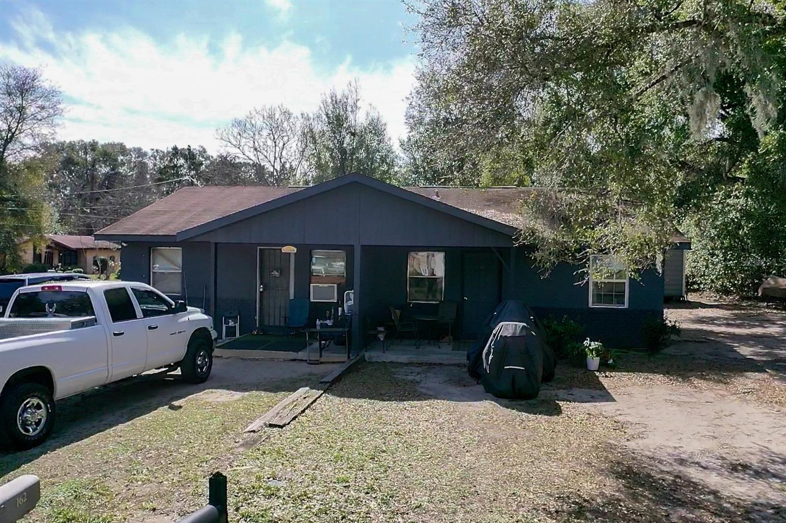 This well maintained duplex offers an excellent opportunity for both first-time homebuyers and savvy investors. Each side features a cozy 2-bedroom, 1-bath layout with 690 sq ft of living space, providing a total of 1,380 sq ft of rental income potential. Currently, both units are occupied producing a combined rental income of $1,500/month. Situated on a spacious quarter-acre corner lot, this duplex is conveniently located just minutes away from downtown, offering easy access to shopping, dining, and entertainment. Additionally, it’s a short drive from the world-renowned World Equestrian Center, making it a prime location for various lifestyle and business needs. Whether you're looking for a home to live in while renting out the other unit or seeking a reliable income-producing property, this duplex is a fantastic choice. Don't miss out on this perfect blend of convenience, comfort, and investment potential!