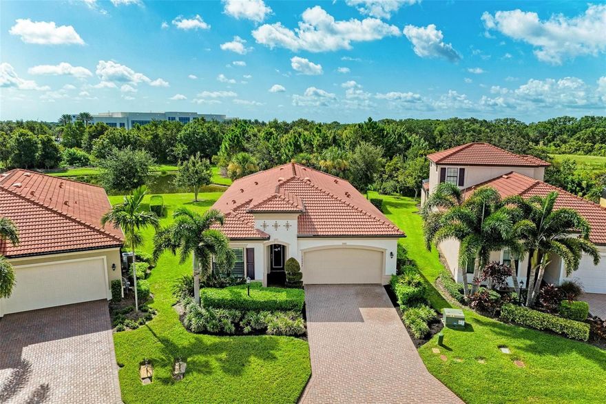 When only the best will do…this Key Largo model home is something special! Meticulously maintained and even improved upon! Located in The Links at Rosedale Golf & Country Club, a maintenance free, gated, socially active community. No expense has been spared here in this 3 Bedroom, 3 ½ Bath, 2,389 sq. ft. home. Situated on a quiet, peaceful, preserve water conservation lot. Experience the Florida lifestyle entertaining outside on your oversized screened paved lanai, grilling out with the fully equipped outdoor kitchen, relaxing by, or taking a swim in your very own private heated pool. Special features inside this spectacular home you will find 3 spacious bedrooms with each having its own ensuite full baths, a bonus study/office/den with closet, 10’ inside laundry room with additional storage cabinetry, space for sewing/crafting etc... The kitchen is a chef’s dream with quartz countertops, oversized breakfast bar, light abundant cabinetry, walk in pantry, upgraded high-end appliances, gas range with decorative hood. Other features and upgrades worth mentioning are 4 qty. 2019 new high impact windows, hurricane shutters, alarm, designer lighting, fans and hardware, tray ceilings, crown molding, high quality engineered wood plank flooring, plantation shutters throughout and so much more!  Whether you're seeking an active or a more relaxed environment, Rosedale has something to offer each member of its community. With the deeded social membership to the Rosedale Golf & Country Club, you can enjoy amenities such as lighted Har-Tru tennis courts, bocce courts, and a 22,000 square foot clubhouse with a heated junior-size Olympic swimming pool, the recently upgraded fitness center features Peloton Bikes and mirror exercise equipment, daily workout classes and access to personal trainers. The Clubhouse features a full-service restaurant that hosts numerous social events and activities throughout the year. For the avid golfer, Rosedale Golf and Country Club offers various levels of golf memberships. HOA fees conveniently include cable & internet, landscaping, 24/7 manned gates, and dog parks. Rosedale is a meticulously maintained community conveniently located just east of I-75 between SR-70 and SR-64 - centrally located to restaurants, UTC mall, the airport, great schools, and some of the best beaches in the country! No CDD fees here! Seeing is believing, schedule your tour of this home today!