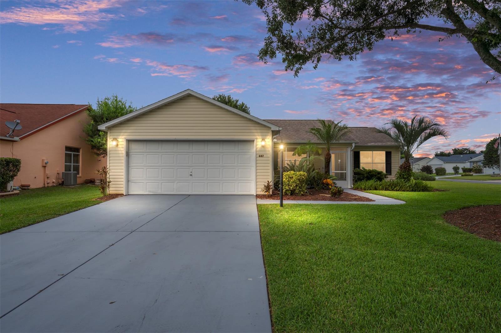 Location, location, location! Conveniently situated just a short ride to Spanish Springs and Lake Sumter Landing! NO BOND! Welcome to this beautifully updated 2/2 Galveston Ranch home on a private corner lot with a 2-car garage, offering the perfect blend of style, comfort, and convenience. The inviting COVERED FRONT PORCH is perfect for enjoying morning coffee or an afternoon cocktail! This well-maintained home features a comfortable SPLIT FLOOR PLAN that has been freshly painted with NO POPCORN ceilings and has NEW LVP flooring throughout (NO CARPET). The kitchen boasts GRANITE countertops, a farmhouse stainless steel sink, WHITE CABINETS that reach the ceiling, and NEW SS appliances. The primary bedroom includes a large WALK-IN CLOSET with BUILT-INS and an updated bathroom with a GRANITE countertop, a STEP-IN SHOWER, and a linen closet. The guest bedroom has a ceiling fan and a WALK-IN closet, with the guest bathroom across the hall featuring GRANITE countertops and a TUB/SHOWER combo. This LOCATION is EXCELLENT—take a quick golf cart ride to Spanish Springs Town Square or Sumter Landing! Golf, pickleball, swimming pools, recreation centers, and a variety of shopping, dining, and medical services are all conveniently close. Contact me today to schedule your private tour!
