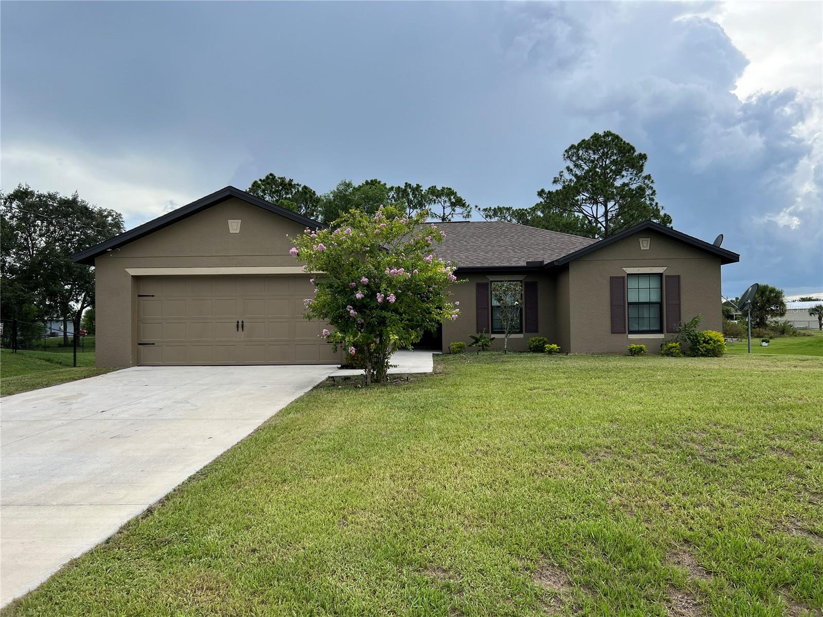 Available immediately!! -- This home is like new built in 2019 and features 3 bedrooms, 2 baths, and 2 car garage. The home offers a wonderful open, split-bedroom floorplan. The large kitchen, with plenty of cabinets to go along with the pantry, overlooks the living room with vaulted ceilings and tons of natural light! The master bedroom suite features a large walk-in closet and its own private bathroom. The other two bedrooms are on the other side of the home with a shared guest bathroom. Upgraded with like new luxury vinyl plank flooring throughout the bedrooms. Outside your living area, there is a covered open patio so you can enjoy relaxing or entertaining outside rain or shine. The home has desirable western exposure perfect for southwest Florida sunsets. This home is ready for an immediate move-in. Call today!