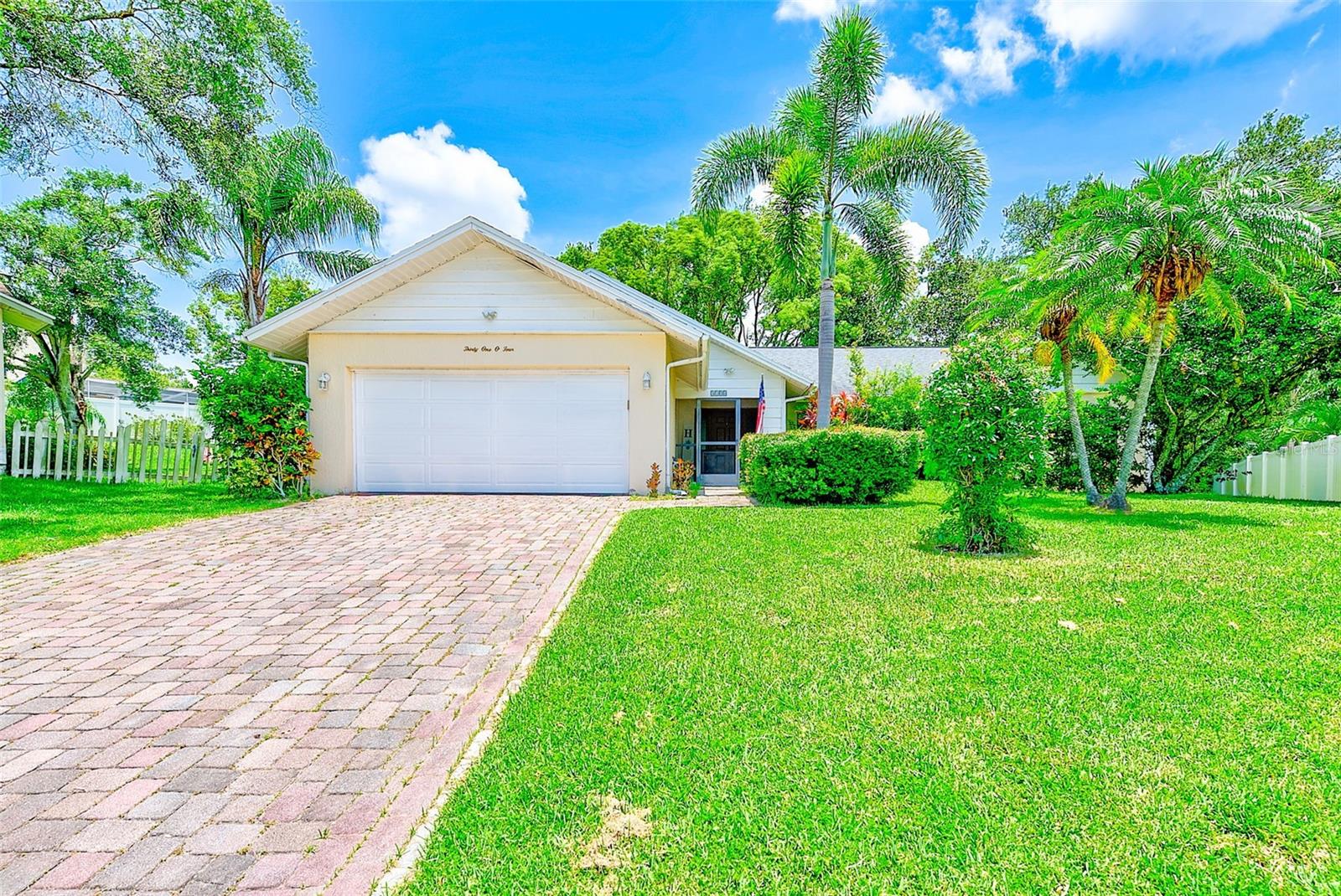Welcome to your dream home at 3104 Hillside Ln in the picturesque Safety Harbor, FL! This exquisite, upgraded residence features 3 spacious bedrooms and 2 luxurious bathrooms, perfectly situated on a serene cul-de-sac lot that gracefully backs onto a stunning city park, complete with a playground and beautiful walking trails.
Step outside to your oversized, enclosed screened lanai, a sanctuary ideal for serene evenings or lively gatherings with friends and family. The chef's paradise kitchen is a true masterpiece, showcasing elegant wood cabinetry, a generous breakfast bar, opulent granite countertops, and top-of-the-line appliances that make culinary creations a joy.
The expansive family and living rooms are designed for entertaining, highlighted by soaring vaulted ceilings and an inviting decorative fireplace that exudes warmth and charm. Stylish laminate and tile flooring throughout ensures effortless upkeep and a seamless flow from room to room. Additional perks include a well-appointed indoor laundry room and a roomy garage for all your storage needs.
Experience the perfect blend of comfort, luxury, and convenience in this stunning home, located just minutes from the vibrant downtown Safety Harbor area, known for its delightful shops and gourmet restaurants. With the beautiful Gulf beaches and excellent commuting options to anywhere in the Tampa Bay area nearby, this outstanding location truly has it all!