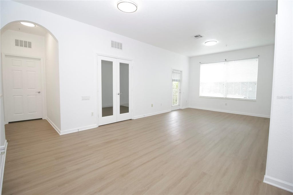 Photo of 3326 Robert Trent Jones Drive #20402, Orlando, FL 32835 (MLS # O6447941)