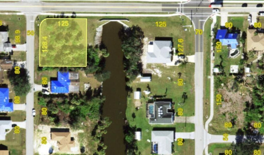 Photo of 1012 Waterside Street, Port Charlotte, FL 33952 (MLS # O6303852)