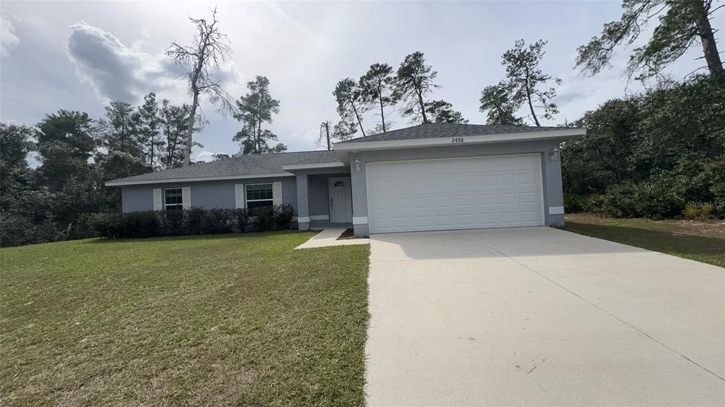 Photo of 2458 SW 170th Loop, Ocala, FL 34473 (MLS # OM713376)