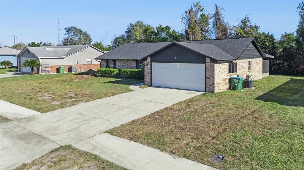 Photo of 861 Shenandoah Avenue, Deltona, FL 32725 (MLS # O6370370)