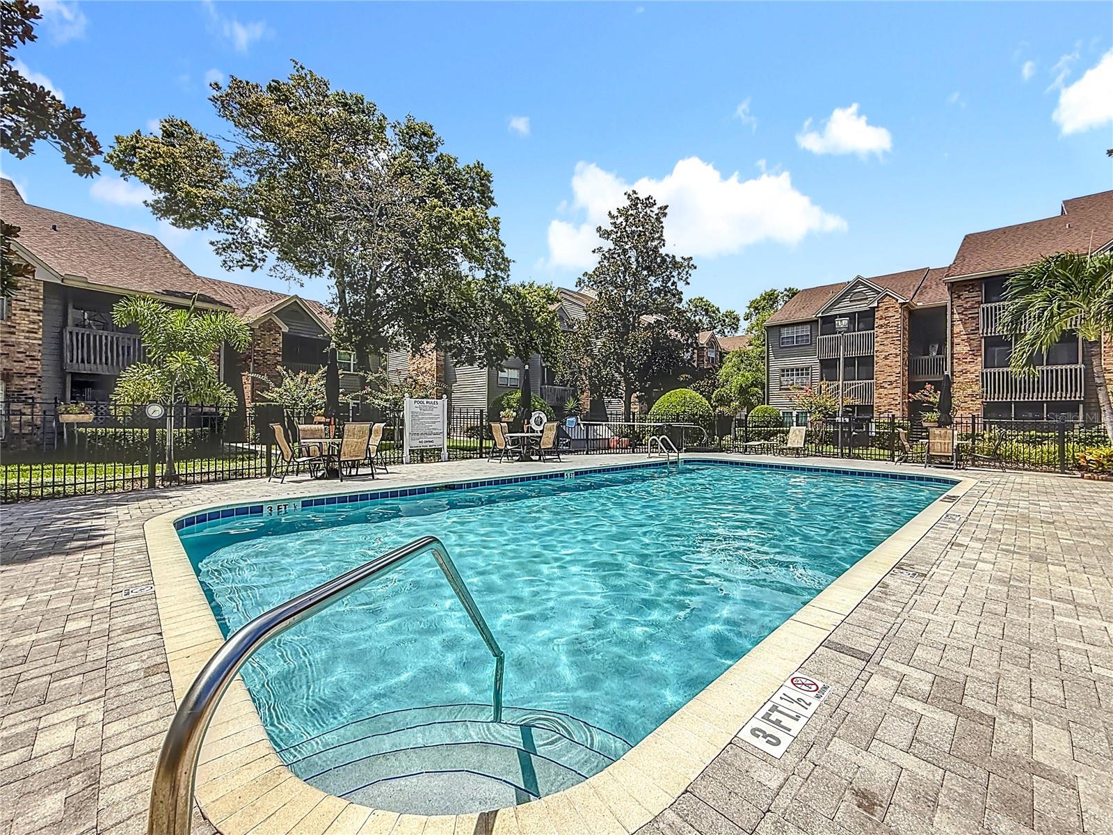 ** MOTIVATED SELLER** Welcome to The Fountains, a GORGEOUS Private and Gated Community with a PERFECT LOCATION right off of US 19!!! This stunning 2 bedroom, 2 bathroom condo offers a perfect blend of comfort, convenience, and resort-style living. Step inside to discover beautiful flooring and updated kitchen with all new appliances! This condo boasts a myriad of desirable features including newer stainless steel appliances and AC!!! Even better.....the Washer and Dryer are included!!! This beauty also has a relaxing screened in porch with extra storage!!! If your an investor these units can be rented out on day 1! The Fountains offer a charming courtyard setting the stage for a peaceful retreat. With two parking spots included, convenience is never compromised. Venture into the community and discover an array of amenities designed to enhance your lifestyle. Take a dip in the large heated inground pool, host gatherings and BBQ at the clubhouse which can be rented out for parties, or maintain your fitness routine at the gym. - For pet lovers, a dog park provides a space for furry friends to play and socialize. 2 pets are allowed! - Added comfort- this home is NOT in a flood zone and the community just had their MILESTONE inspection COMPLETED!!! - With the beach and town just a stone's throw away- 6 Miles away from Honeymoon Island and 12 miles away from Clearwater Beach, you'll enjoy the best of both worlds - a serene retreat with the vibrancy of coastal living at your fingertips. Don't miss out on this opportunity to experience a vacation vibe every day!! Schedule your viewing today and make this Clearwater condo your new home sweet home!!!