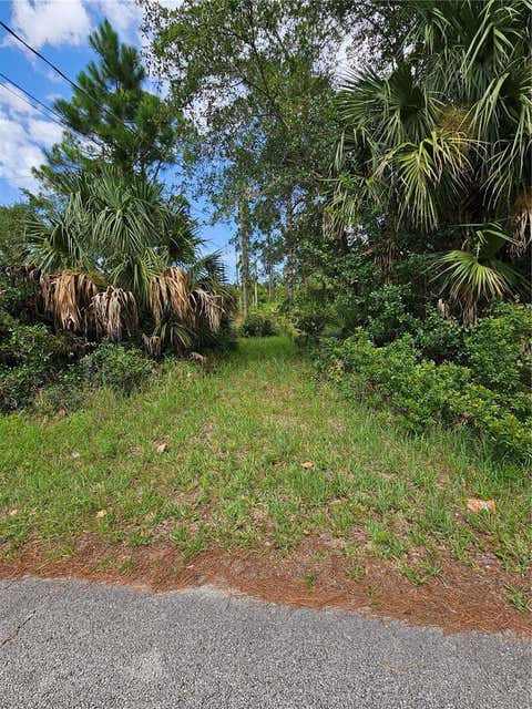 Photo of 1715 Tatum Boulevard, New Smyrna Beach, FL 32168 (MLS # V4950368)