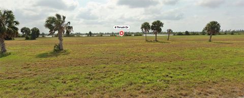 Photo of 8 Thrush Drive, Placida, FL 33946 (MLS # O6405238)
