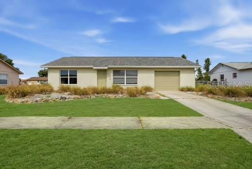 Step into a simple, easy Florida lifestyle with this 2-bedroom, 1-bath home set on an oversized lot in a well-established community. Inside, you’ll find a comfortable layout with a combined living and dining area, a functional kitchen, and generously sized bedrooms. Natural light fills the main living spaces, creating a bright and open feel throughout.

The attached garage adds everyday convenience, while the spacious yard offers plenty of room to expand, garden, or create your own outdoor retreat.

Located in a deed-restricted community with low annual fees, residents enjoy access to a community pool, fitness center, tennis courts, and sidewalks for evening walks. Whether you're looking for a full-time residence, seasonal getaway, or investment opportunity, this property offers a solid foundation in a growing area close to shopping, dining, and Gulf beaches.

Flood Policy IS ASSUMABLE!