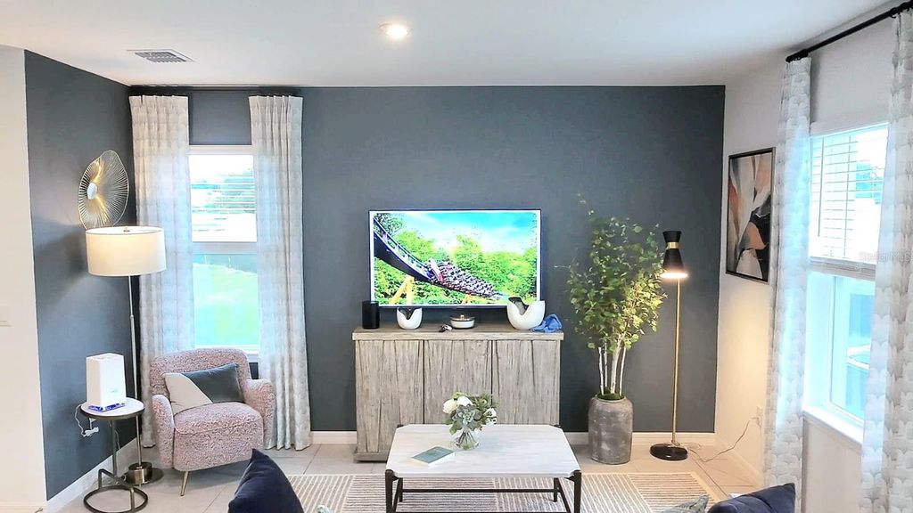 Photo of 1602 Fan Palm Drive, Davenport, FL 33897 (MLS # O6367361)