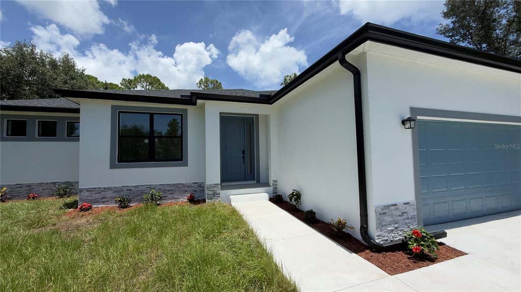 Photo of 14300 Sanilac Avenue, Port Charlotte, FL 33981 (MLS # S5153466)
