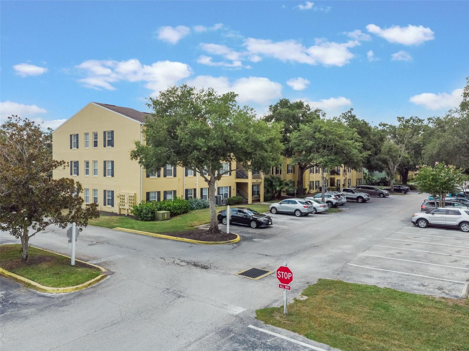 Move-in ready 3BR/2BA condo in the gated Miriada community of East Orlando! This 2nd-floor unit features a spacious split floor plan, brand-wood flooring, new carpet, indoor laundry, and plenty of natural light. Enjoy resort-style amenities including a pool, fitness center, clubhouse, playground, park, dog walk area, and car wash station. Conveniently located near Orlando International Airport (MCO), major highways, shopping, and dining. Pets welcome!