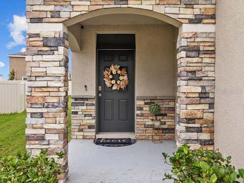 Photo of 17006 Wave Tressle Place, Wimauma, FL 33598 (MLS # TB8481385)