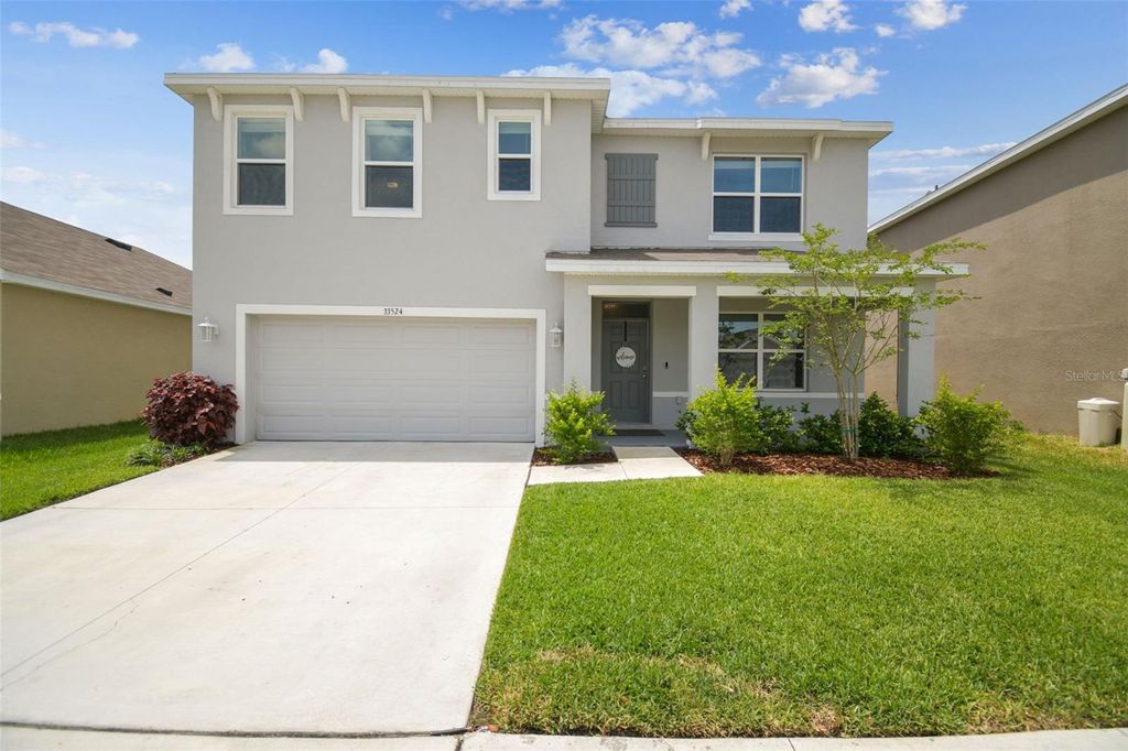 Photo of 33524 Elm Hill Branch, Wesley Chapel, FL 33545 (MLS # TB8387534)