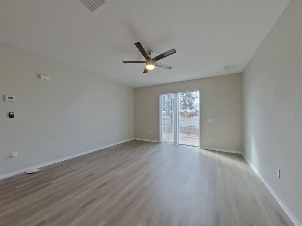 Photo of Kissimmee, FL 34758 (MLS # TB8482124)