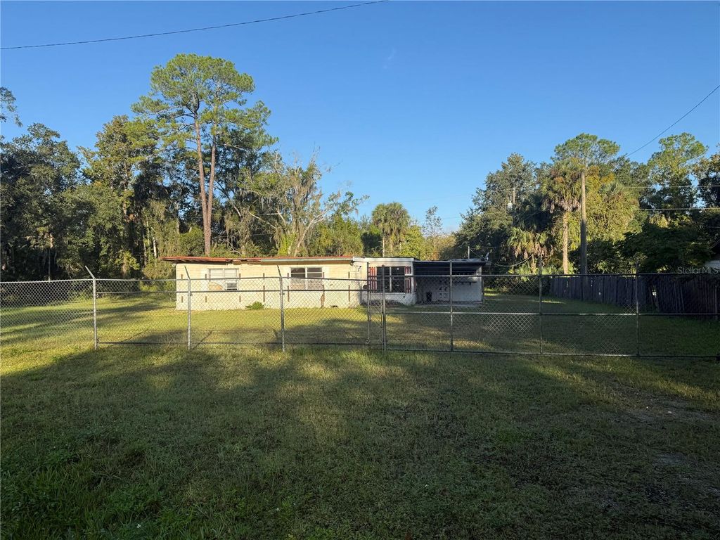 Photo of 2857 W New York Avenue, Deland, FL 32720 (MLS # V4945485)