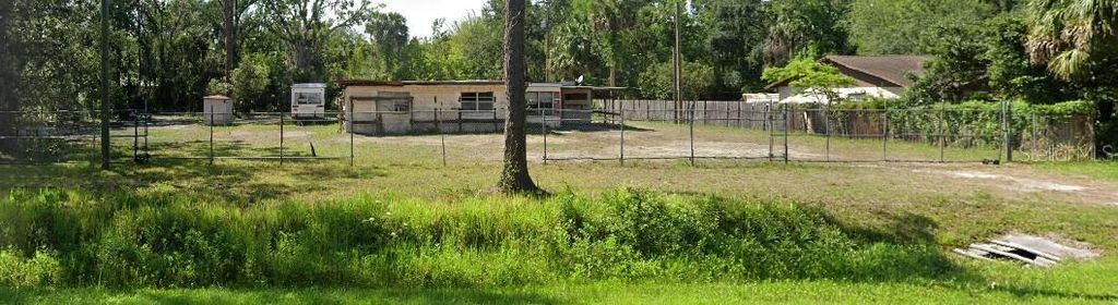 Photo of 2857 W New York Avenue, Deland, FL 32720 (MLS # V4945485)