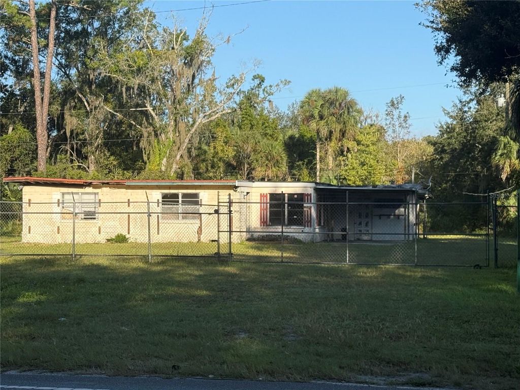 Photo of 2857 W New York Avenue, Deland, FL 32720 (MLS # V4945485)