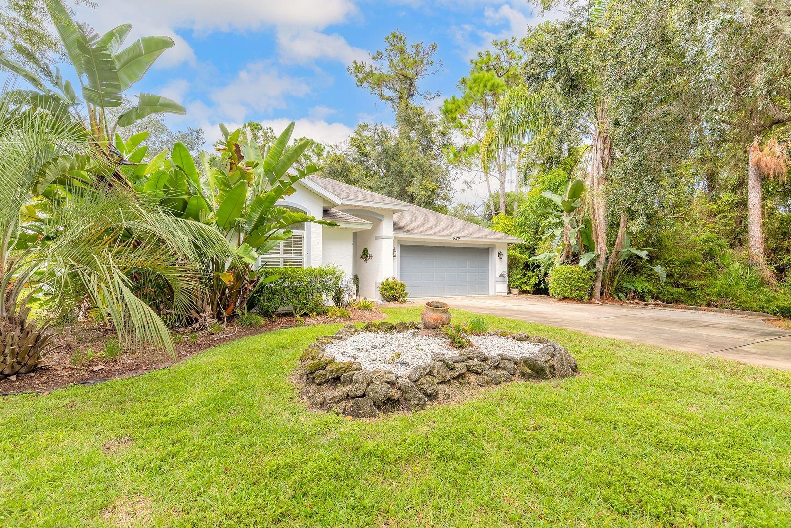 Don't Miss out on this Pool Home in Beautiful Plantation Bay. Secure and Gated Golf Course Community. Sits Right at 1/2 Acre of Land! Last Home on the Street. Extra Long Driveway. Located on the end of the Cul-de-sac with Plenty of Parking. Backyard View of the Lake and Golf Course! Screened in Pool and Lanai. Newer Stainless Appliances (2022). Newer Roof (2022). Newer A/C (2023) Tile Flooring Throughout! Updated Master Bath. Master Bedroom has His and Hers Closets. Pool was just resurfaced this year. (2025) Pavers on Pool Deck. Inside Laundry. Updated Kitchen with a Farmhouse Sink. Butcher Block Counters.