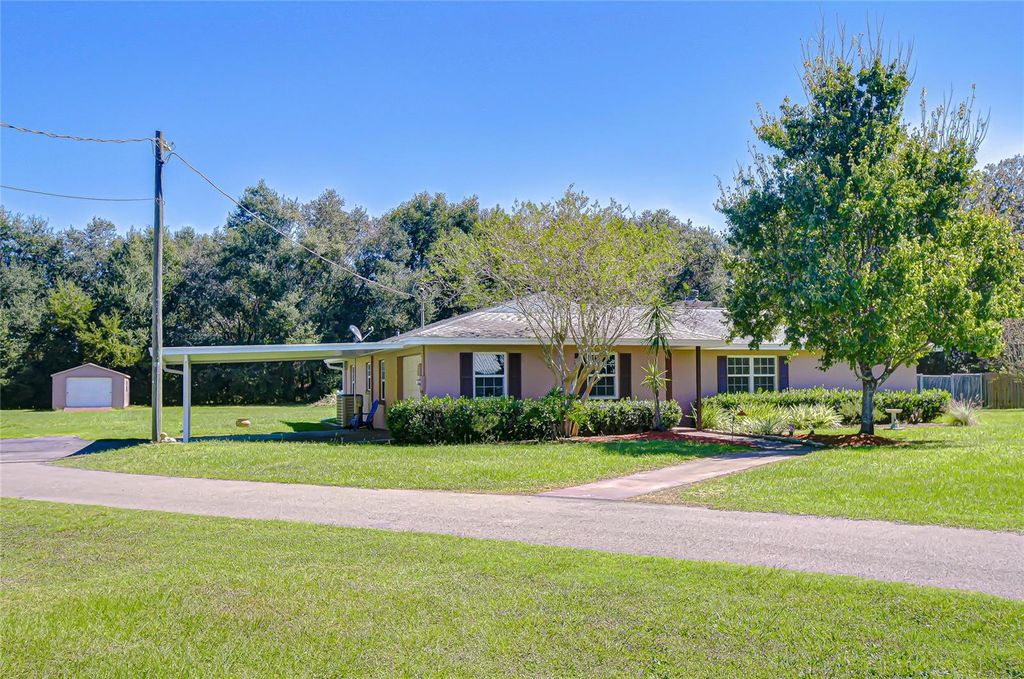 Photo of 12442 Green Oak Lane, Dade City, FL 33525 (MLS # TB8438113)