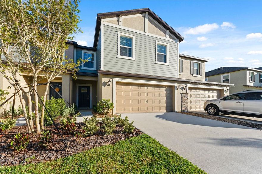 Absolutely stunning 3 BR /2.5 Bath / 2 Car Garage + LOFT townhome in ultra-modern and green-focused New Community of Angeline! ALL the best upgrades and conveniences. This is the LARGE (2319 SF!) floor plan home which includes a large upstairs LOFT/media/office/gym area. Every year home design continues to improve and expand on the features and amenities modern buyers want, and this home epitomizes that progress. Intelligent design features like a large open and bright kitchen designed to entertain w/ a walk-in kitchen pantry, a truly beautiful oversized quartz island/breakfast bar, surrounded by classic solid white cabinetry with premium bright white quartz countertops. Featuring GE® stainless steel appliance package. Everything you could want in a "chefs dream kitchen". Upstairs is the master suite with a bedroom-sized GIANT WALK-IN CLOSET and ensuite bathroom that is AMAZING! With a double vanity/his & her sinks, a garden soaking tub, with separate walk-in shower w/ subway tile, all designed to feel like a spa-like retreat within your own home. Washer and dryer are included, with an upstairs laundry room. Lawn Care & High speed (200/200 Mbps) internet included. The outdoor covered lanai has views of the conservation area. Angeline is a new “Master Planned” community and a wonderful place to live, with sprawling green spaces spanning 3,600 acres, and a serene freshwater lagoon offering beachfront activities. Outdoor enthusiasts will be thrilled with over 100 miles of trails suitable for walking, jogging, or biking. Great schools including a brand-new ANGELINE STEM SCHOOL OF INNOVATION, plus a planned community pool and community farm, With easy access to FL-State Road 52, 589, and Interstate 75 making shopping and commuting a breeze.  Apply today!